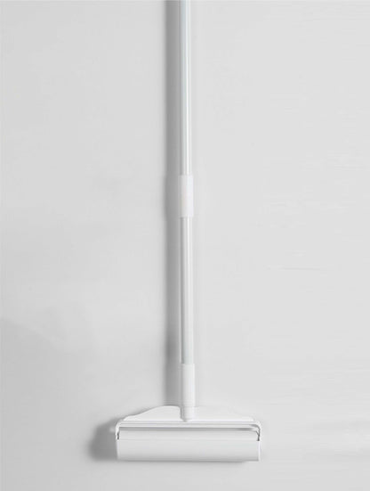 Extended retractable sticky lint roller